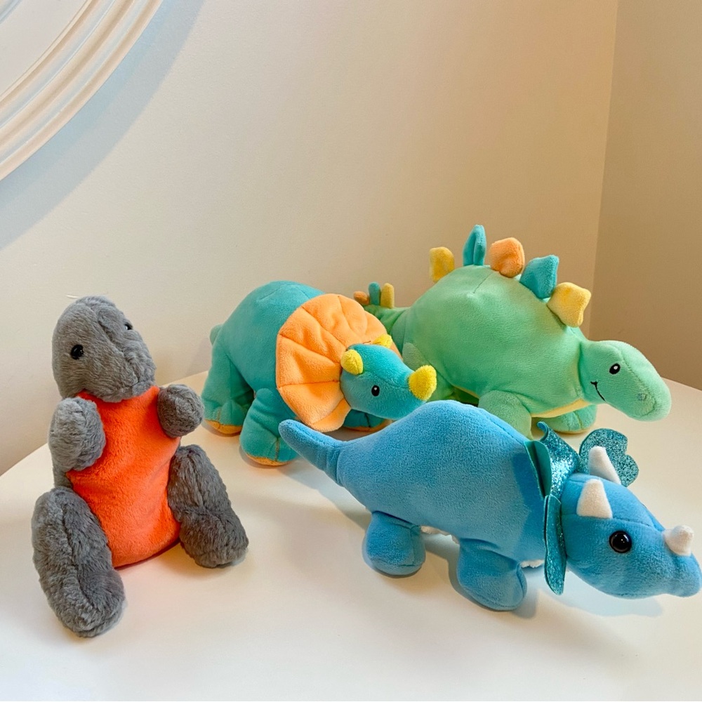 Plush dinosaur lot- includes 4 dinosaurs